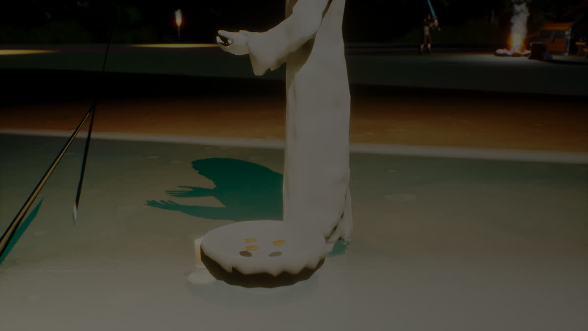 Coins in the stone offering bowl of a wayside shrine, the robed figure's hand held out above