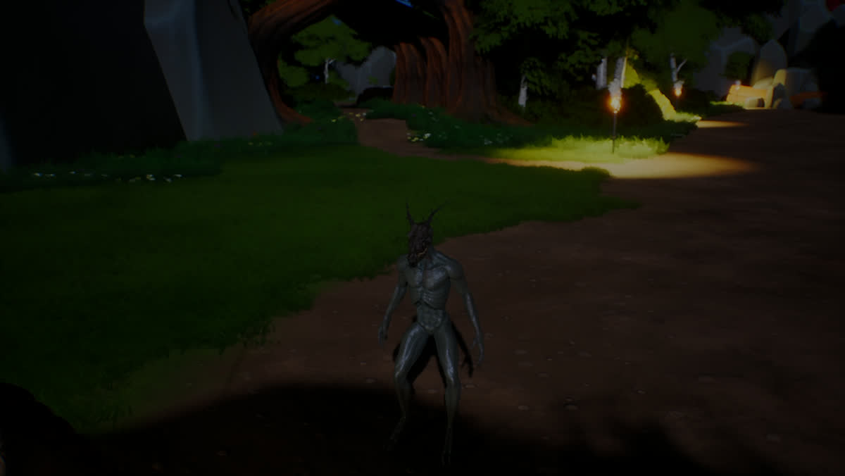 The Skinwalker in its true form standing on a torch-lit forest road at night